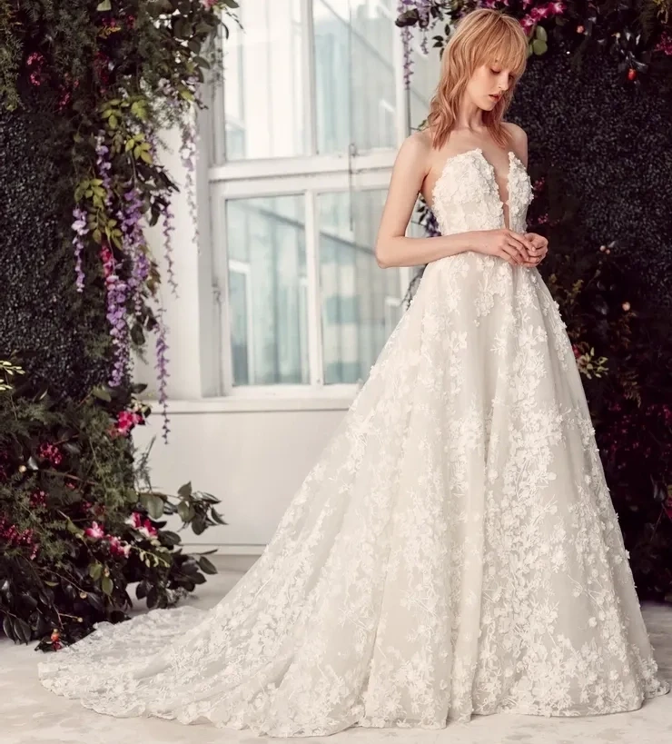 Model wearing a white gown